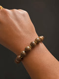 Bracelet élastique perles en bois naturel & séparateurs dorés
