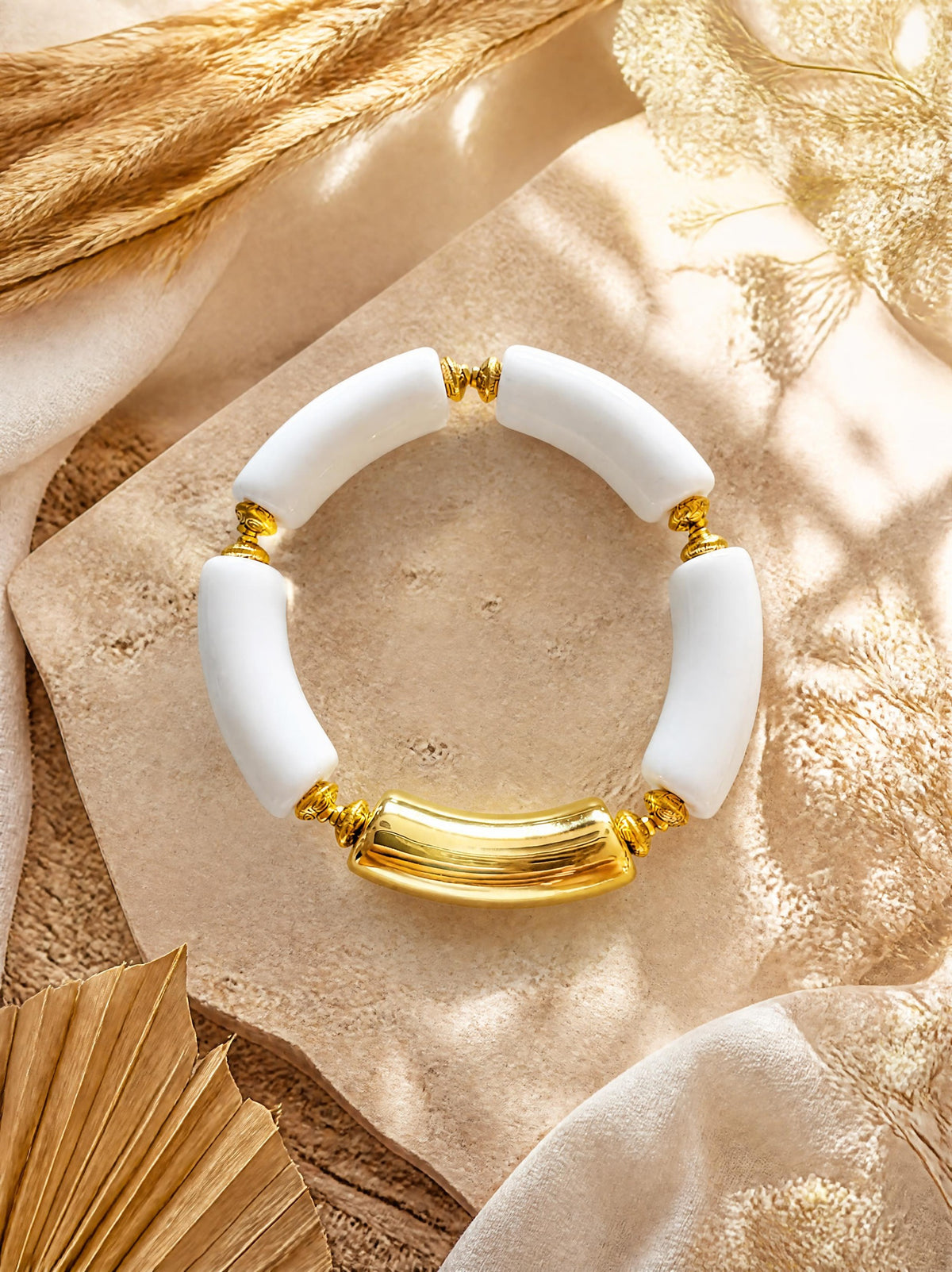 Bracelet élastique perles incurvées & séparation dorée