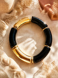 Bracelet élastique perles incurvées noir & doré